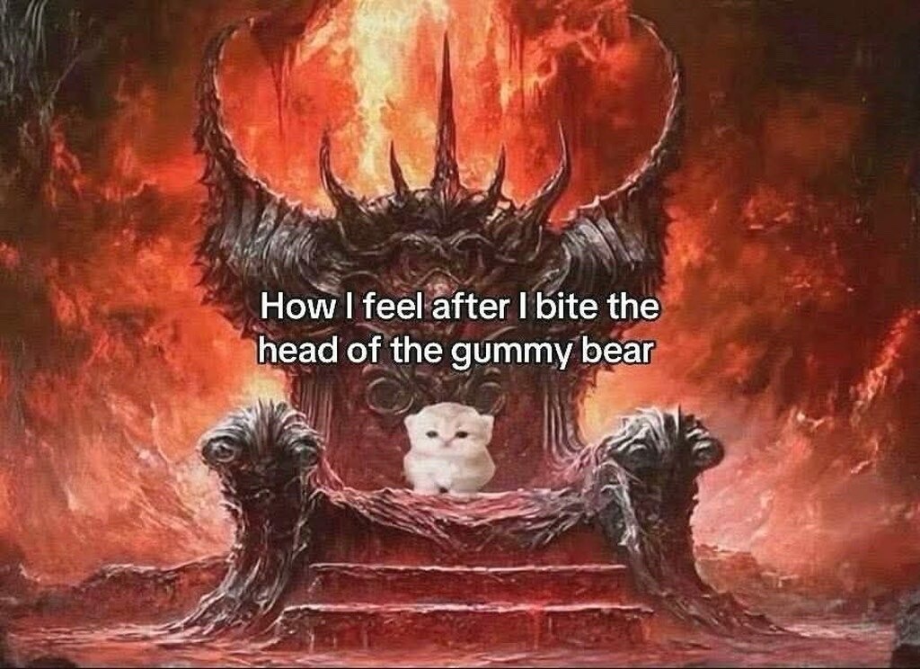  Tiny kitten photoshopped onto Satan's flaming throne in hell: "How I feel after I bite the head of the gummy bear"